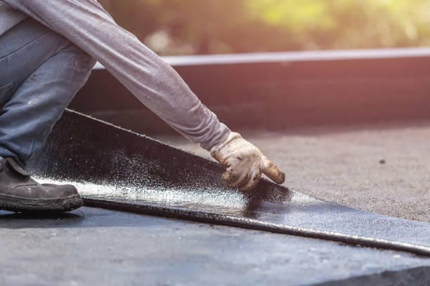 Professional Basement Waterproofing technician working in Bladensburg, OH